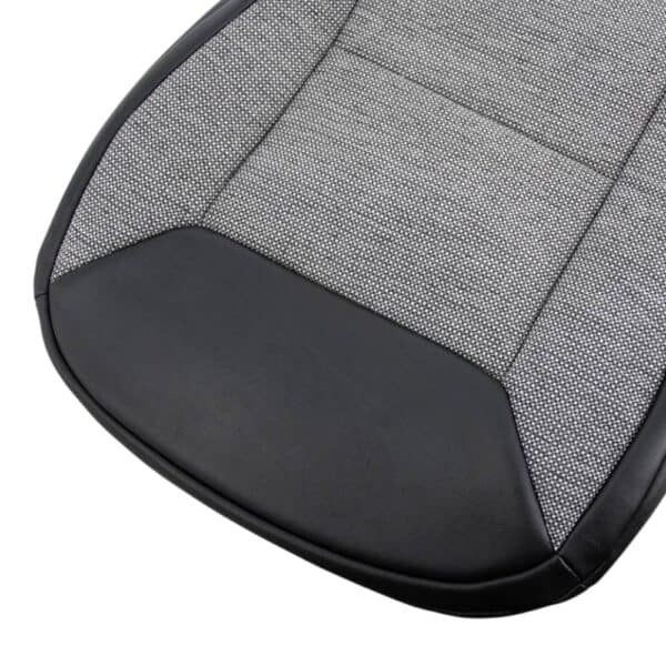 dodge-1500-2500-3500-promaster-synthetic-leather-with-cloth-inserts-2014-2025-black-front-driver-bottom-close-view-oem-replacement-seat-cover Dodge Ram Promaster 2014-2025 | Funda de asiento de recambio OEM